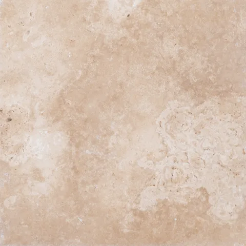 Stonelux Ivory Travertine sample with creamy beige tones and natural pores