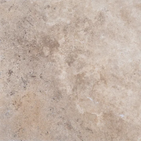 Stonelux Philly Travertine sample with warm beige, taupe and grey movement